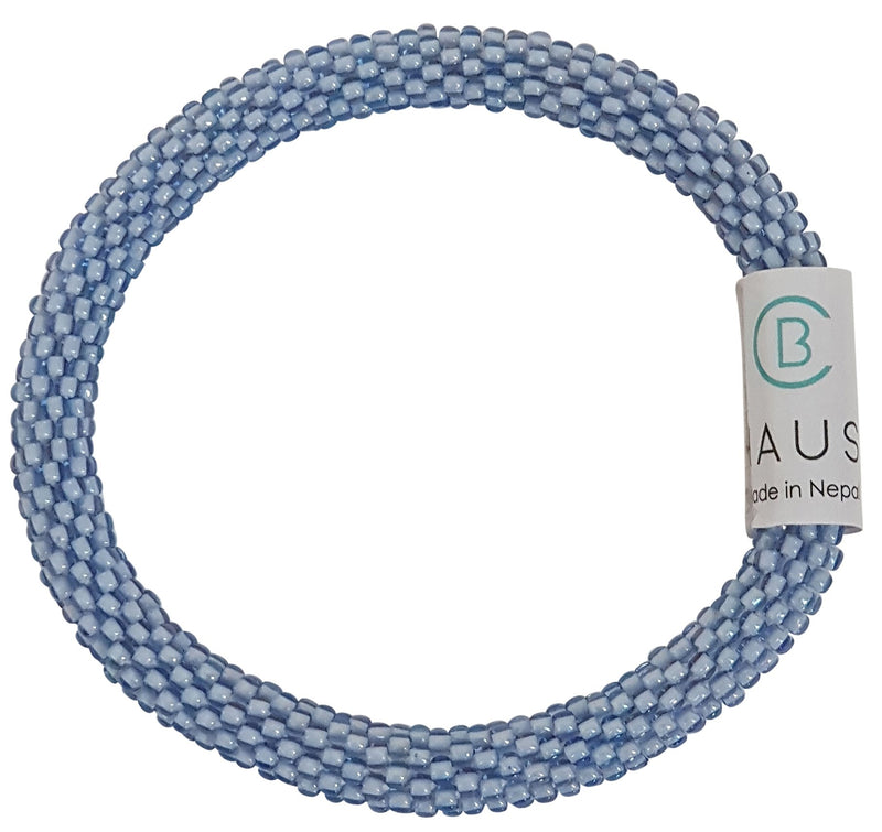 Light Blue Sapphire Roll - On Bracelet