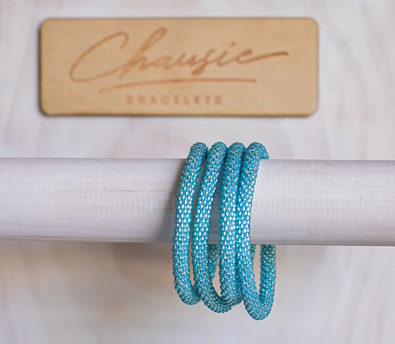 Aquamarine Silver-Lined Roll - On Bracelet