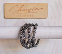 Silver Lined Grey Roll - On Bracelet