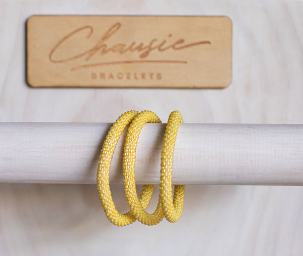 Yellow Lined Crystal Roll - On Bracelet